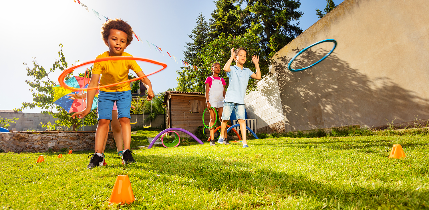 children playing obstacle course